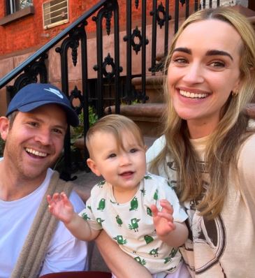 Brianne Howey with her husband Matt Ziering and baby